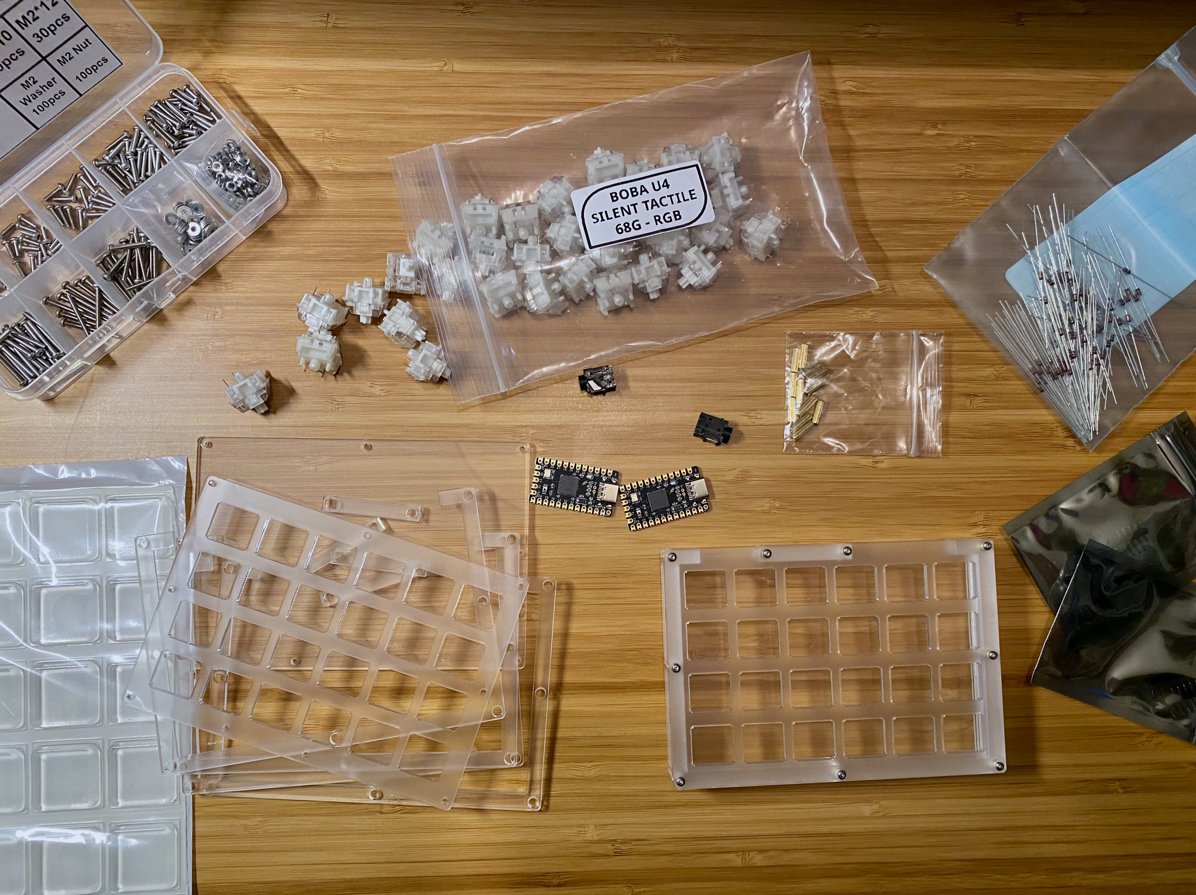 All the supplies for the build except the PCB, spread out on a desk